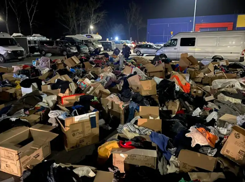 A large open area with hundreds of cardboard boxes containing various supplies